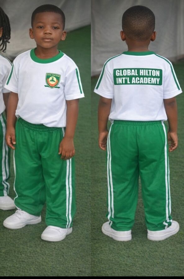 Global Hilton International Academy pupil in school uniform, front and back view
